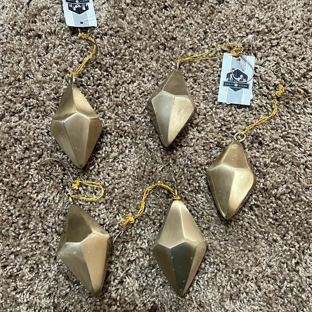 5 gold Scott living ornaments.  All new. A few scuffs